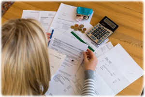 Woman Paying Bills